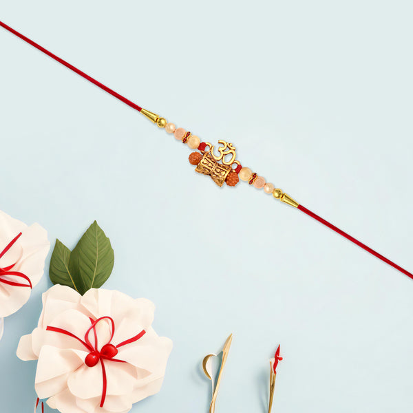 Elegant Golden Charm Rakhi With Pearl Beads And Red Thread  Traditional Raksha Bandhan Bracelet For Brother