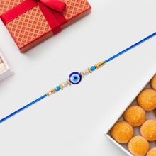 Stylish Blue Thread Rakhi With Central Stone Pearl Beads And Golden Detailing  Elegant Bracelet For Raksha Bandhan
